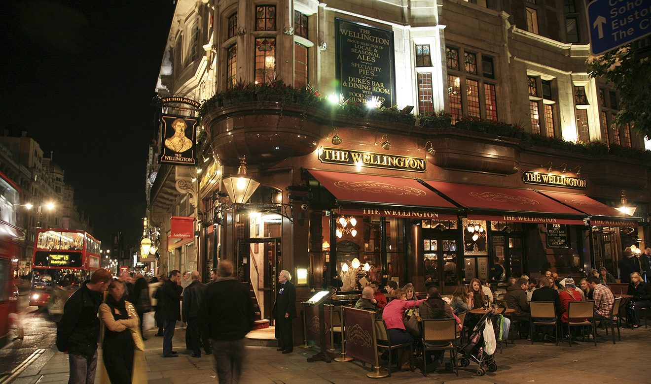 London, UK - November 06, 2010: Outside view of a public house, known as pub, for drinking and socializing, is the focal point of the community, Pub business, now about 53,500 pubs in the UK, has been declining every year.