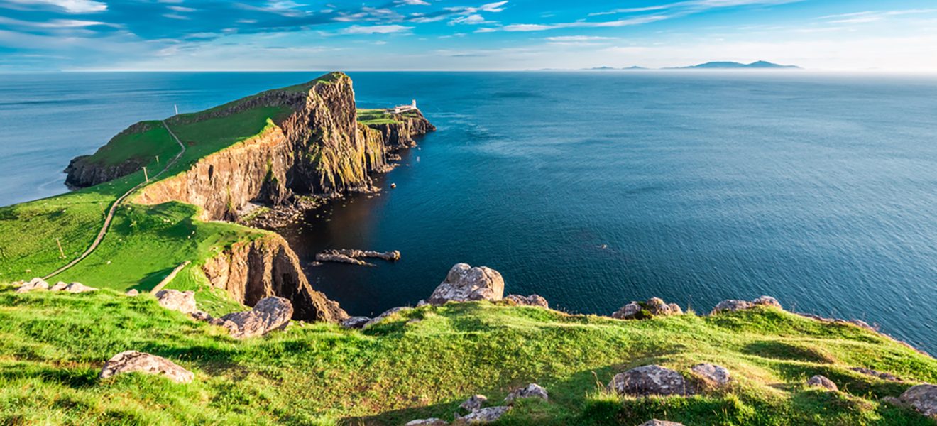 Stunning dusk at the Neist point lighthouse in Isle of Skye, Scotland